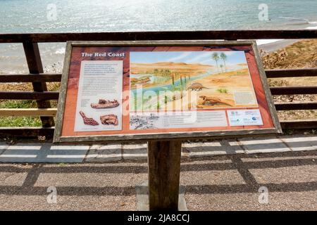 Sidmouth, Devon, UK - August 8 2018: An information board explaining the Red Coast at Sidmouth in Devon, England, UK Stock Photo
