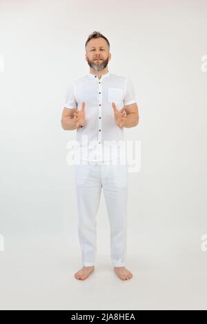 Man explaining something in studio Stock Photo - Alamy
