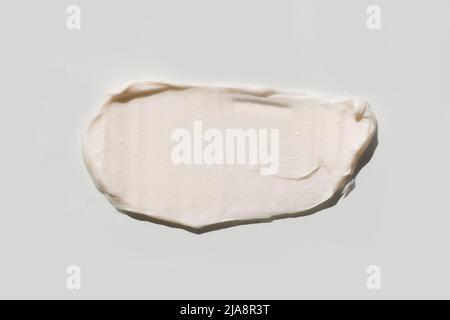 Top view of the cosmetic cream on white background, different swatches. Pastel colors. Good as cosmetics mockup Stock Photo