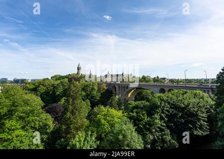 Luxembourg city, May 2022.  Adolphe Bridge. Stone bridge from the early 1900s with a picturesque view from above and a peaceful park at its foot. Stock Photo