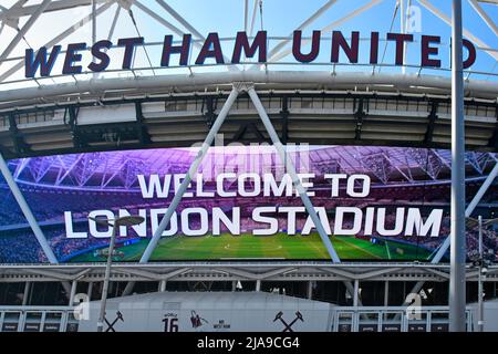 Welcome sign for London Stadium on giant outdoor television screen below West Ham United sign Olympic stadium Queen Elizabeth Olympic park England UK