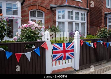 The British Union Jack flag decorating an English home as preparation for the Platinum Jubilee of Queen Elizabeth 2. Stock Photo