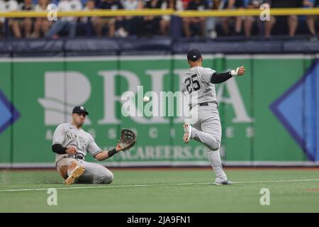 New York Yankees second baseman Robinson Cano throws to first base after  forcing out Texas Rangers' Josh Hamilton (32) during the first inning of a  baseball game Wednesday, June 15, 2011, at