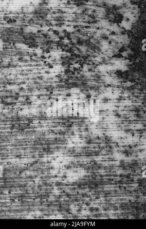 Heavily rusted metal plank in black and white. Stock Photo