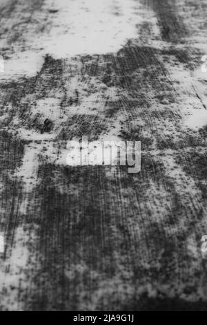 Heavily rusted metal plank in black and white. Stock Photo