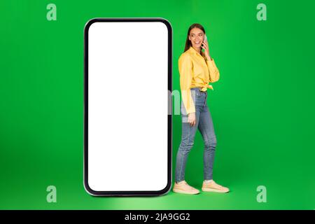 Cheerful woman talking on cellphone, gadget mockup Stock Photo