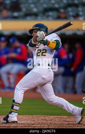 Oakland, USA. 26th May, 2022. Texas Rangers first baseman Nathaniel Lowe  (30) swings at a pitch during the fourth inning against the Oakland  Athletics in Oakland, CA Thursday May 26, 2022. (Image