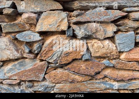 Rectangular stone wall in ocher tones Stock Photo