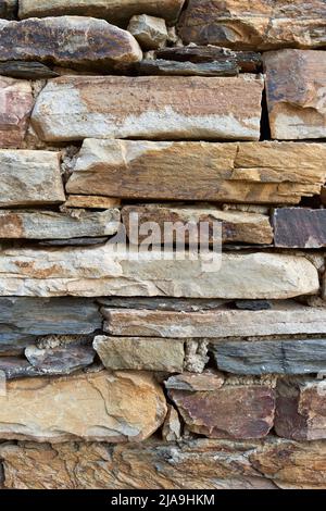 Rectangular stone wall in ocher tones Stock Photo
