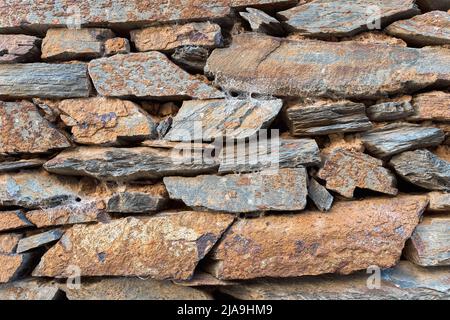 Rectangular stone wall in ocher tones Stock Photo