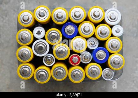 collecting used alkaline batteries for recycling Stock Photo