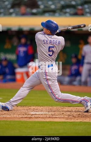 Texas Rangers shortstop Corey Seager throws to first after forcing out ...