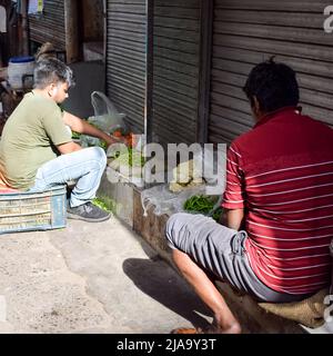 Old Delhi, India – April 15, 2022 - Portrait of shopkeepers or street vendors in Chandni Chowk market of Delhi, Old Delhi Street Photography Stock Photo