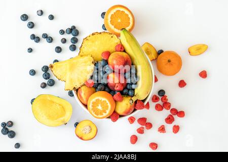 Tropical fruits on a white background top view. Stock Photo
