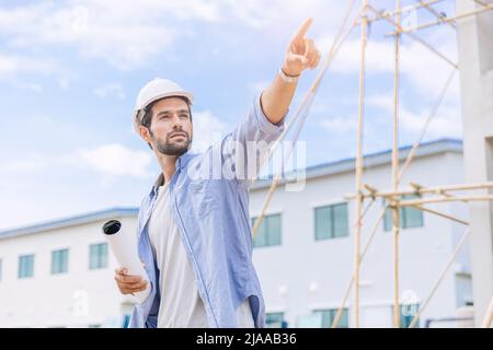 Engineer builder. Foreman work in construction site. senior worker project designer leader concept. Stock Photo
