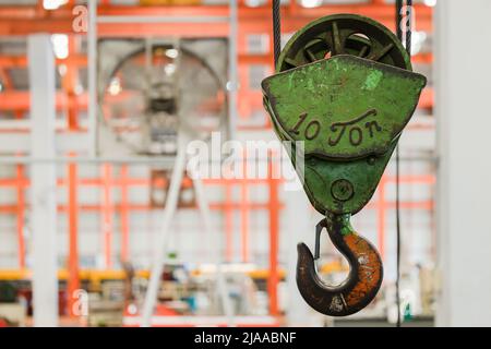 10 Tons hook head chain hoist crane lifting machine tool in heavy industry factory Stock Photo