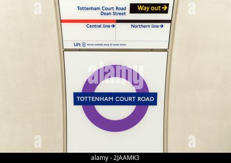 Tottenham Court Road Elizabeth Line roundel sign showing way out and other tube lines. London Stock Photo