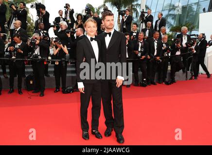 Cannes, France. 28th May, 2022. Belgian director Lukas Dhont (R) and Belgian actor Eden Dambrine for the film 'Close' pose at the red carpet during the closing ceremony of the 75th edition of the Cannes Film Festival in Cannes, southern France, May 28, 2022. Credit: Gao Jing/Xinhua/Alamy Live News Stock Photo