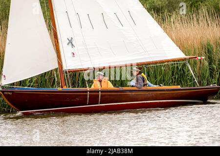 Horning, Norfolk, UK – May 28 2022. Traditional wooden sailing boat competing in the 2022 Three Rivers race, an annual boat race on the Norfolk Broads Stock Photo