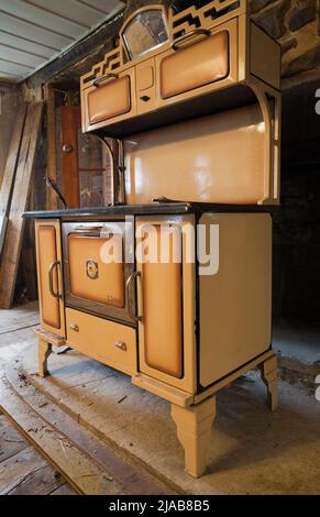 Antique 1949 L'islet wood burning stove in dining room inside old circa ...