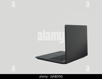 Black lap top computer with shadow isolated on grey background. Copy space. Working from home concept. Stock Photo