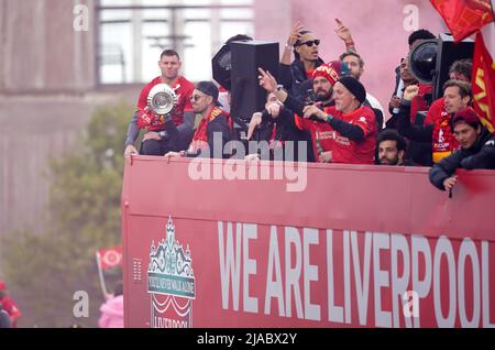 Liverpool's Jordan Henderson holds the Emirates FA Cup trophy on an open-top bus during the trophy parade in Liverpool. Picture date: Sunday May 29, 2022. Stock Photo