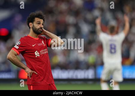 Paris, France. 28th May, 2022. Mohamed Salah of Liverpool FC reacts as Toni Kroos of Real Madrid celebrates in the background following the final whistle of the UEFA Champions League match at Stade de France, Paris. Picture credit should read: Jonathan Moscrop/Sportimage Credit: Sportimage/Alamy Live News Stock Photo