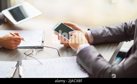 Business team working on a scheme business using the tablet and smartphone Stock Photo