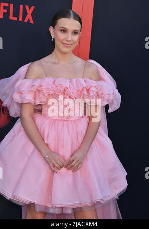 WESTWOOD, LOS ANGELES, CA, USA - OCTOBER 26: Actress Millie Bobby Brown  wearing a Calvin Klein dress arrives at the Los Angeles Premiere Of  Netflix's 'Stranger Things' Season 2 held at the