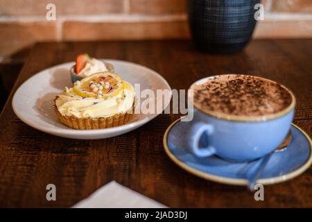 Cup of hot chocolate with lemon cream pie Stock Photo
