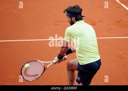 BARCELONA - APR 20: Nikoloz Basilashvili in action during the Barcelona Open Banc Sabadell Tennis Tournament at Real Club De Tenis Barcelona on April Stock Photo