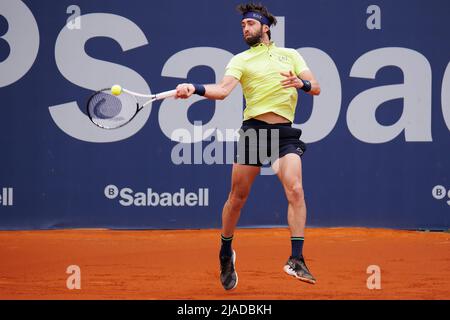 BARCELONA - APR 20: Nikoloz Basilashvili in action during the Barcelona Open Banc Sabadell Tennis Tournament at Real Club De Tenis Barcelona on April Stock Photo