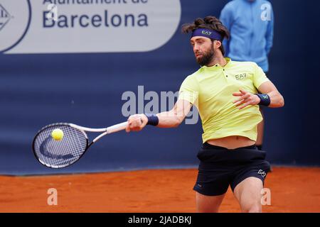 BARCELONA - APR 20: Nikoloz Basilashvili in action during the Barcelona Open Banc Sabadell Tennis Tournament at Real Club De Tenis Barcelona on April Stock Photo