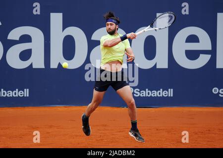 BARCELONA - APR 20: Nikoloz Basilashvili in action during the Barcelona Open Banc Sabadell Tennis Tournament at Real Club De Tenis Barcelona on April Stock Photo