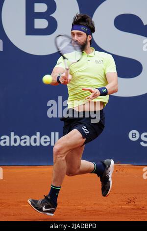 BARCELONA - APR 20: Nikoloz Basilashvili in action during the Barcelona Open Banc Sabadell Tennis Tournament at Real Club De Tenis Barcelona on April Stock Photo