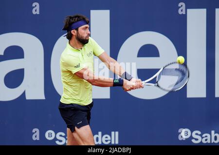 BARCELONA - APR 20: Nikoloz Basilashvili in action during the Barcelona Open Banc Sabadell Tennis Tournament at Real Club De Tenis Barcelona on April Stock Photo