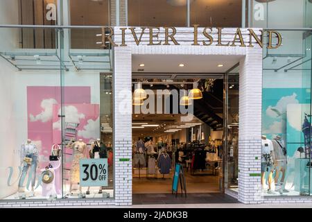 High Wycombe, England - July 21st 2021: River Island shop in the Eden shopping centre. The chain is privately owned by the Lewis family. Stock Photo