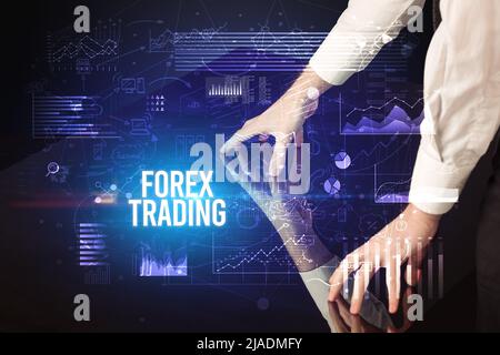 Businessman touching huge screen concept Stock Photo