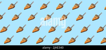 Many slices of tasty pumpkin pie on light blue background. Pattern for design Stock Photo