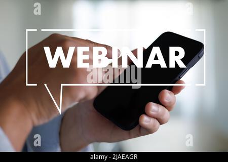 WEBINAR hand on table use E-business Browsing Connection in computer, coffee break in classroom to use cloud communication Stock Photo