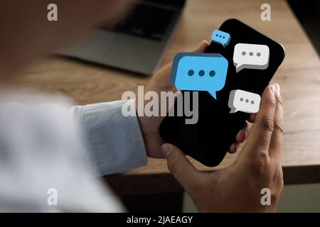 pop up Social media men hand using smartphone typing  chatting Live Chat Chatting on application Communication Digital social network concepts Stock Photo