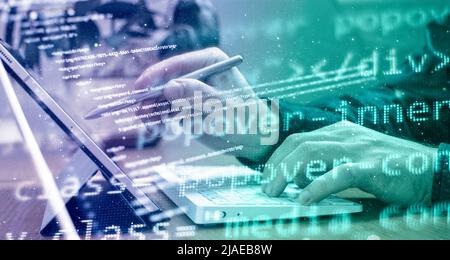 Businessman working with laptop computer on wooden desk in modern office . Programmers and cyber security technologies design. Stock Photo
