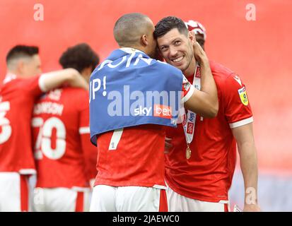 London, UK. 29th May, 2022. Scott McKenna (R) of Nottingham Forest celebrates after winning the Sky Bet Championship match at Wembley Stadium, London. Picture credit should read: Paul Terry/Sportimage Credit: Sportimage/Alamy Live News Stock Photo