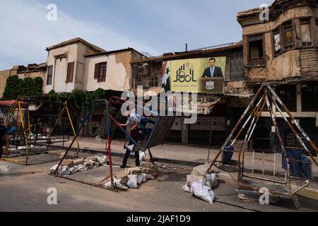 Damascus, Syria - May, 2022: Kids playing on street festival event, children on street playground in Damascus Stock Photo