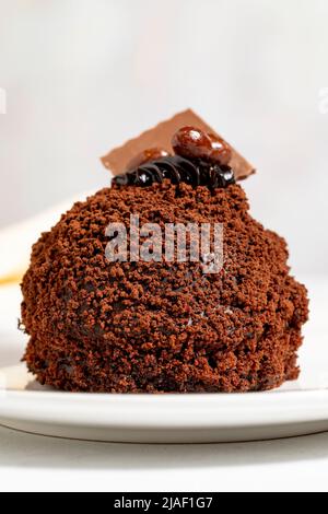 Special design chocolate cake. Chocolate covered cake on a white background. close up Stock Photo