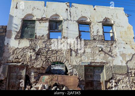 Berbera, Somaliland  Crushed Walls and Abandoned Buildings  on the Streets of Berbera City Stock Photo