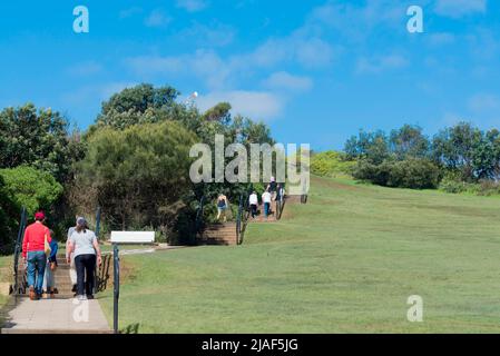 People walking up the concrete path and stairs towards the top of the Skillion at Terrigal on the New South Wales, Central Coast in Australia Stock Photo