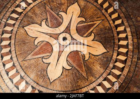 Oriental flooring pattern of vintage wooden parquet. Background photo texture Stock Photo