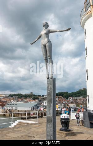 The Diving Belle Statue by Craig Knowles, Lighthouse Pier, Scarborough, North Yorkshire, UK. Stock Photo