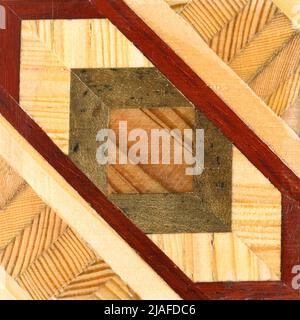 Wooden marquetry, patterns created from the combination of different woods, wooden floor, parquet, cutting board Stock Photo